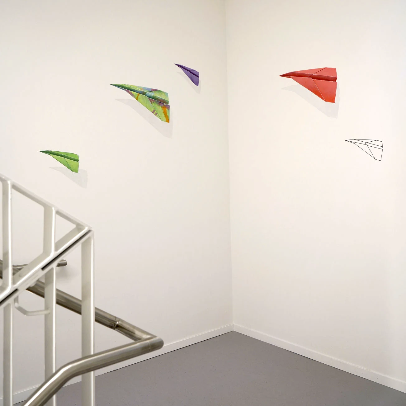 Wandmalerei im Unternehmen, in der Firma | Plan International Deutschland e.V. | Künstlerische Gestaltung des 5-stöckigen Treppenhauses Malerei: Uwe Fehrmann