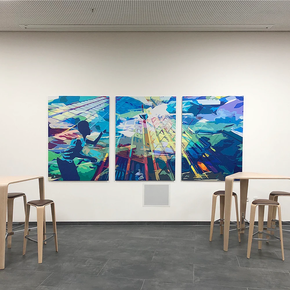 Wandgestaltung mit einem Triptychon in einer Kantine